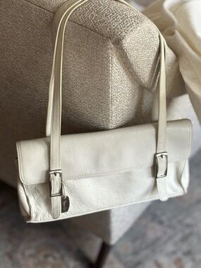 Tignanello Cream Leather Shoulder Bag with Silver Buckles.